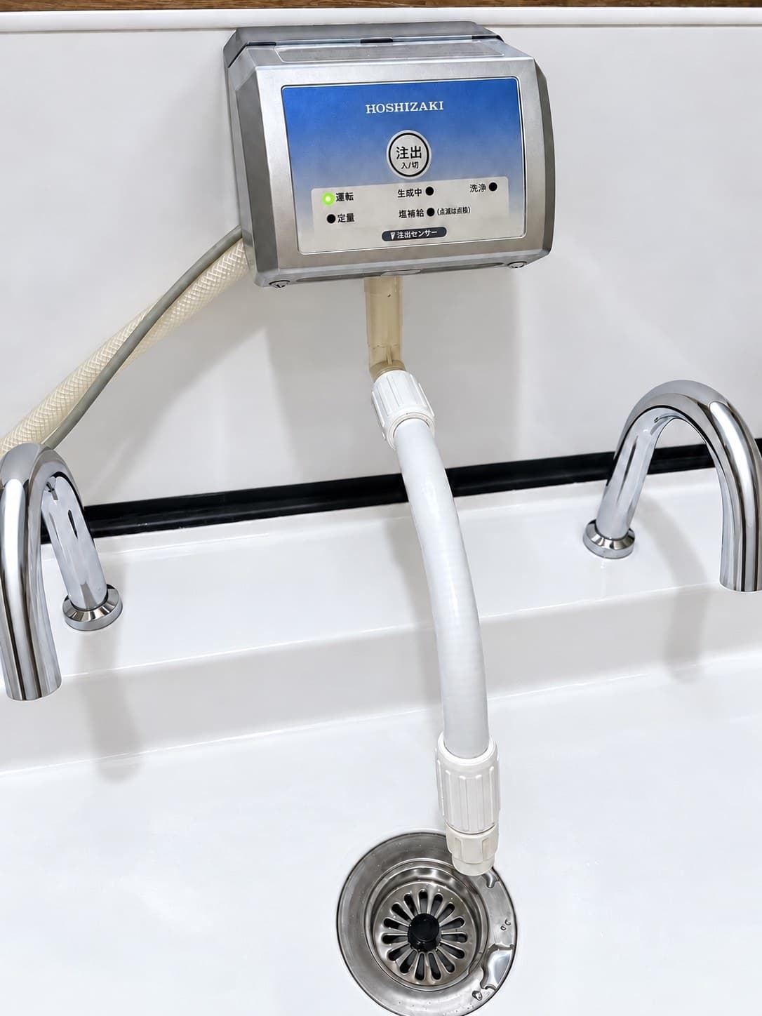 子どもの手洗い場に設置した電解水の注出装置